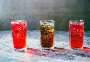 A lot of Soft drinks in colorful and flavorful glasses on the table,Glasses with sweet drinks with...