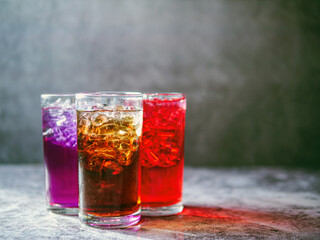 A lot of Soft drinks in colorful and flavorful glasses on the table,Glasses with sweet drinks with...