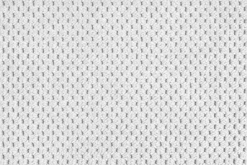 Plain white velour upholstery fabric, fleecy jacquard with macro, closr up pattern weave texture background, cloth textile surface. Wallpaper, backdrop with copy space