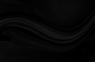 Black gray satin dark fabric texture luxurious shiny that is abstract silk cloth background with patterns soft waves blur beautiful.