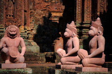 Naklejka premium Sculpture carving ancient ruins antique building Prasat Banteay Srei or Banteay Srey temple of Angkor Wat for Cambodian people travelers travel visit respect pray at Angkor Thom in Siem Reap, Cambodia