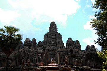 Naklejka premium Sculpture carving ancient ruins antique building of Prasat Bayon Castle or Jayagiri Brahma Temple for Cambodian people and travelers travel visit respect pray at Angkor Thom Wat in Siem Reap, Cambodia