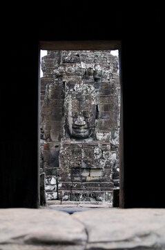 Sculpture carving ancient ruins antique building of Prasat Bayon Castle or Jayagiri Brahma Temple for Cambodian people and travelers travel visit respect pray at Angkor Thom Wat in Siem Reap, Cambodia