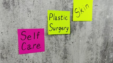 Bright sticky notes with words about taking care of your health. Important reminder on shabby background with words about plastic surgery and skin care. Cosmetology project with simple design