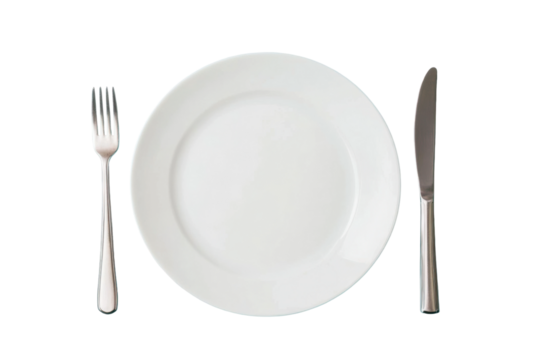 Minimalist table setting with white plate, silver fork, and knife on black background, cut out