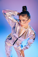 Stylish woman embraces futuristic fashion with holographic colors amid vibrant hues