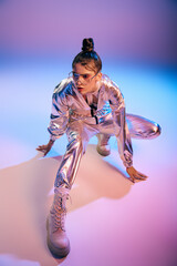Futuristic fashion meets holographic brilliance in a stylish young womans dynamic pose