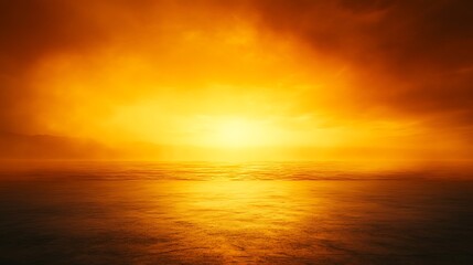 Obraz premium The sun sets over ocean water under a fiery orange sky