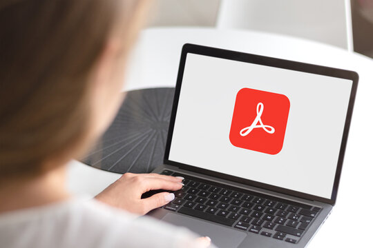 Guilherand-Granges, France - April 02, 2025. Adobe Acrobat enables creating, editing, signing, and managing PDF files across desktop, mobile, and web platforms with advanced features.