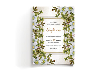 WEDDING INVITATION FRAME WITH FLOWER DECORATIONS AND FRESH LEAVES