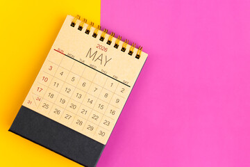 May 2026 desk calendar made from brown paper page on multicolor paper.
