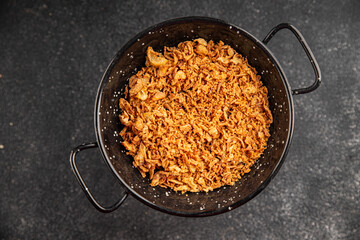 Fried onion crispy onions appetizer vegetables dish fresh delicious gourmet food background on table rustic food top view copy space vegetarian and vegan food