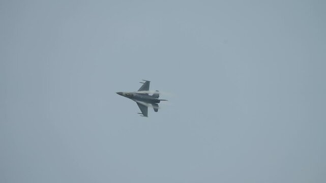 US Airforce F-35 stealth fighter jet during high speed flight and manoeuvres during an air show in Thailand