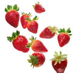 Vibrant strawberries in mid-air, perfect for fresh beverage and packaging design, cutout image