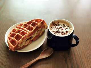 Hot cocoa with ham and cheese waffles