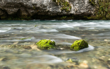 River flow under rocky cliff, detail from mountain river Dabar near Sanski Most