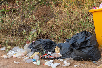 Overflowing trash can_trash bin_garbage can in a Phichit in THAILAND_25 March 2025