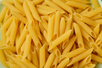 Discover the textures and colors of uncooked pasta in the kitchen