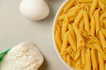 Ingredients for a delicious homemade pasta dish in a cozy kitchen