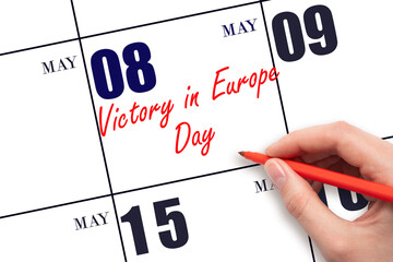 May 8. Hand writing text Victory in Europe Day on calendar date. Save the date.