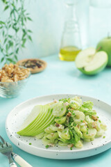A plate with Waldorf salad, traditional American	