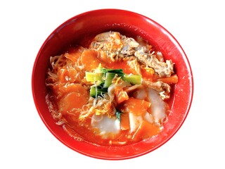 Delicious seblak served in a red bowl, isolated.