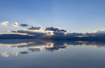 Reflection at sunrise in Erhai Lake in Dali, Yunnan province
