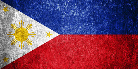 Banner of the grunge Philippines state flag. Dirty Philippines flag on a metal surface.