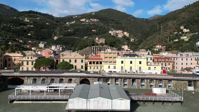 Europe, Italy, Liguria , Bonassola is a  sea village in province of Spezia in Gulf of Tigullio  , Drone  view of seafront with  pedestrian and cycle path through the tunnels from Levanto to Framura 