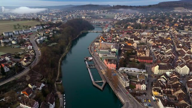 Winter panorama of Schaffhausen, Switzerland. Medieval architecture, Rhine River and cityscape. Aerial perspective highlights city center, historic streets and riverbend. Luftbild Rhein in Schweiz. 