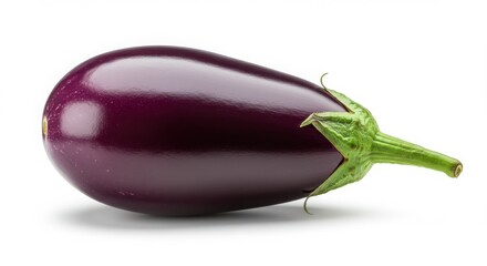 A single shiny purple eggplant with a green stem isolated on a white background in a close up view