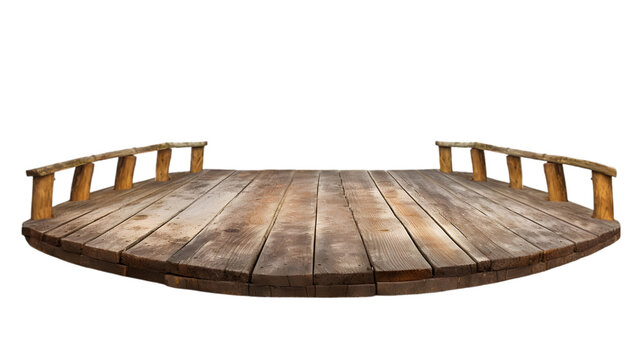 A rustic wooden platform with a railing on a black isolated background