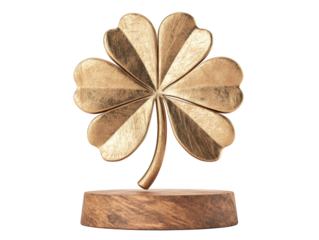 Decorative golden four leaf clover figurine on wooden base, cut out