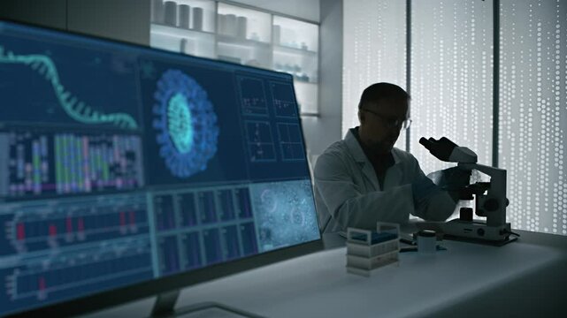 Male scientist in a lab coat working in a futuristic science laboratory with a microscope. Computer display showing the mutating virus