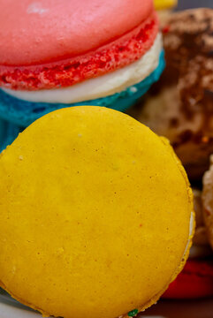 Delicious macaroons and coffee paired with rich chocolate cake at Amelie's French Bakery in Charlotte, North Carolina