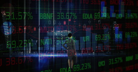Image of stock market and financial data processing over businesswoman