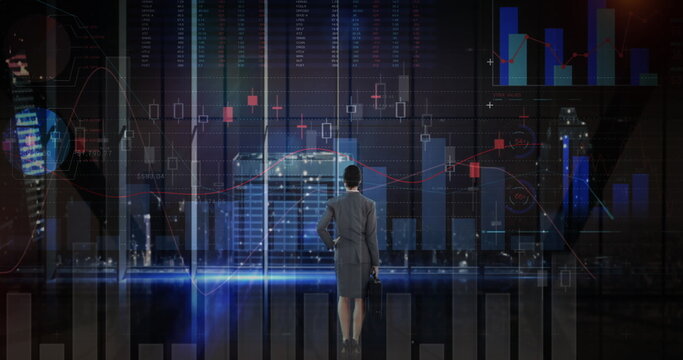 Image of statistics and financial data processing over businesswoman in office