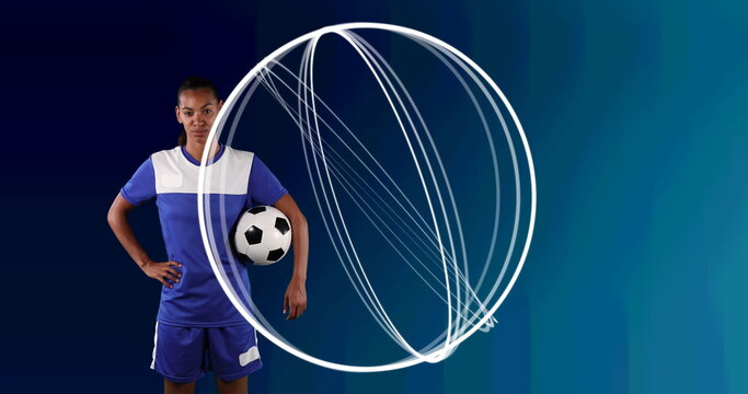 Image of circles over female football player holding ball