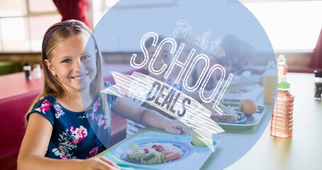 Image of back to school text over children in canteen