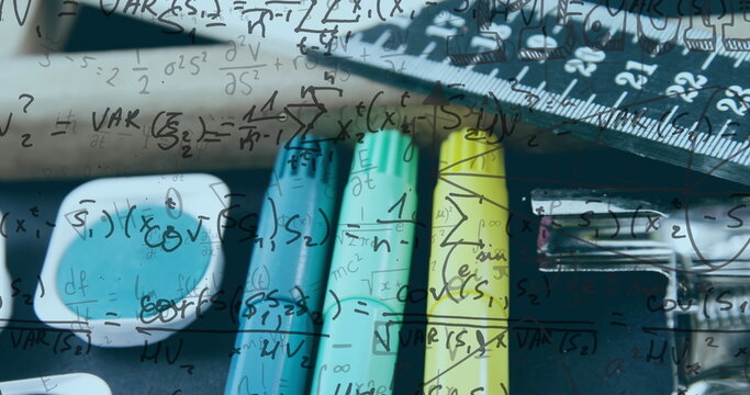 Image of mathematical equations over school items