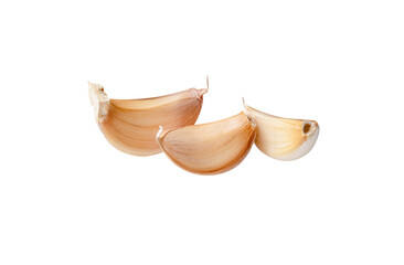 Side view of three unpeeled garlic cloves or pieces in stack isolated on white background with clipping path