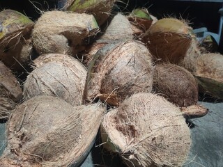 a group of peeled coconuts