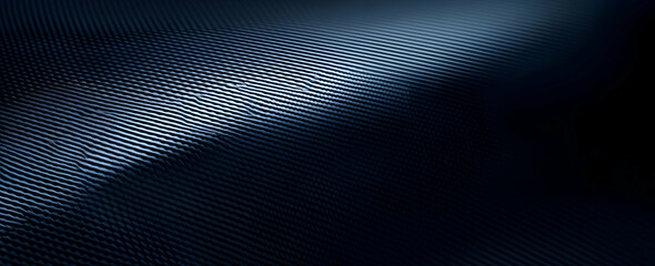 Blue carbon fiber background with a dark gradient, vector illustration