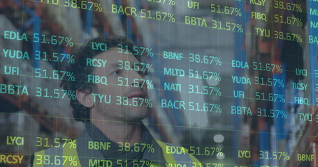 Image of financial data processing over man working in warehouse