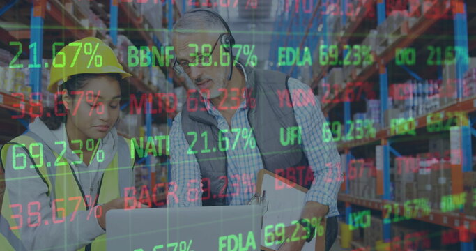 Image of financial data processing over man and woman working in warehouse - Powered by Adobe