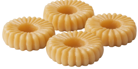 Smooth and Soft Yellow Treats in Circular Shapes with a Decorative Design, Perfect for Sweet Tooth Cravings and Festive Occasions