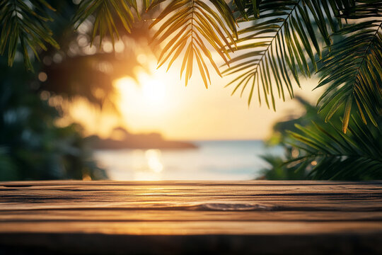 Wooden Tabletop with Tropical Seascape and Palm Leaves at Sunset