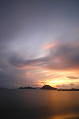 sunset on the beach. Seaside town of Turgutreis and spectacular sunsets. Selective Focus. Long Exposure shoot. tranquility scene.