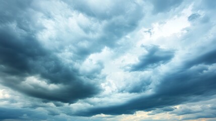 Fototapeta premium Dramatic Sky: The sky is covered with ominous, grey clouds, creating a sense of impending storm and a feeling of tension