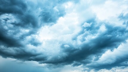 Fototapeta premium Stormy Skies: Dramatic, swirling storm clouds fill the frame, capturing a sense of impending weather, creating a scene of raw power and atmospheric intensity.